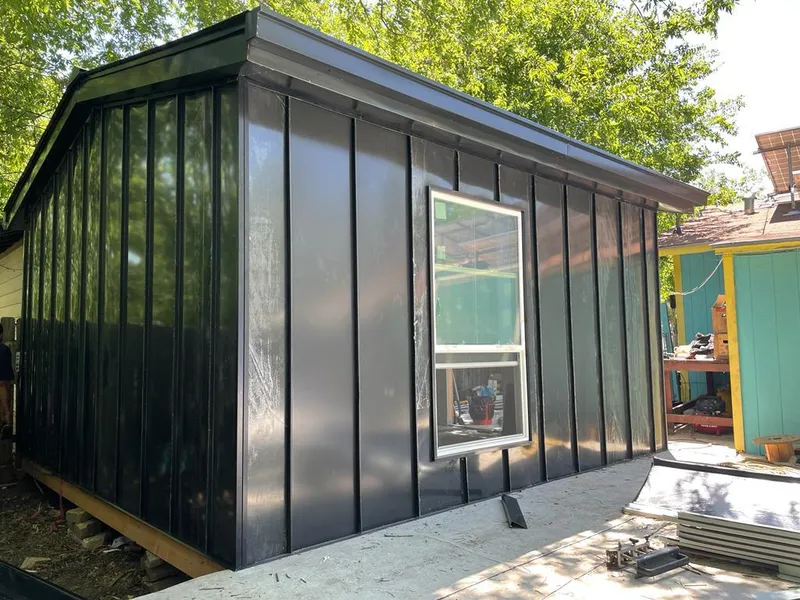 Black standing seam metal wall panels for Metal Roof Installation in Mentone